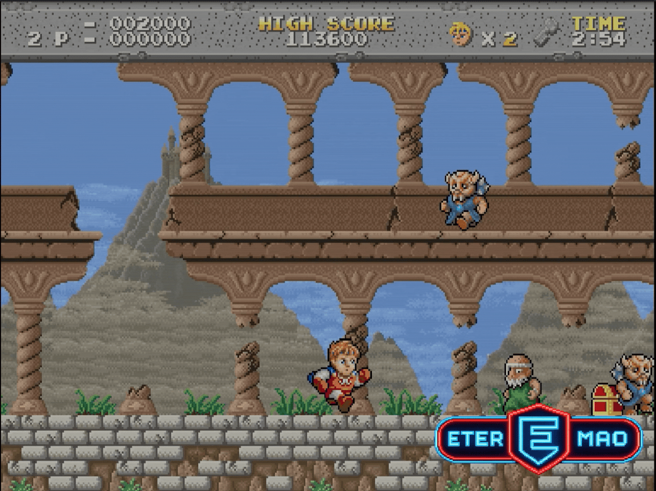 Captura de Legend of Hero Tonma (arcade, Irem 1989) mostrando la Fase 1: Ruinas, primer nivel del juego con ambientación gótica de piedra en ruinas